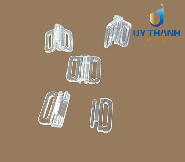 Móc nhựa cài áo ngực màu trắng trong